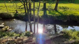 Superbe Moulin au bord d'une riviere, au calme, avec piano