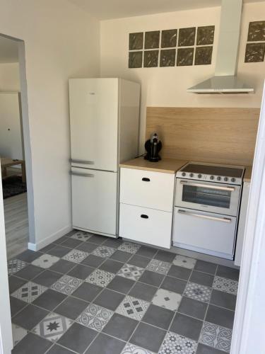 T2 en rez de villa avec jardin à 800m de la plage, à la semaine