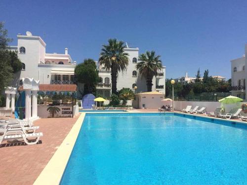 Tavira Small cozy flat by the pool and by the sea