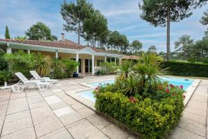 Villa piscine pour 6 a Lacanau au coeur de la foret
