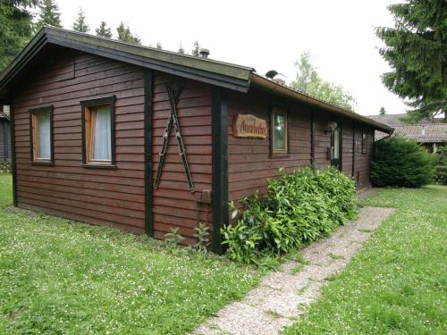 Wooden bungalow with oven, in Oberharz near a lake