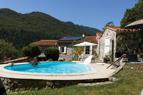 Appartement maison en pierre dans un écrin de verdure 5 puig sec d'abax Saint-Laurent-de-Cerdans