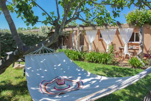 maison kiwi avec piscine chauffée terrasse jardin et bbq à Calvi Calvi france