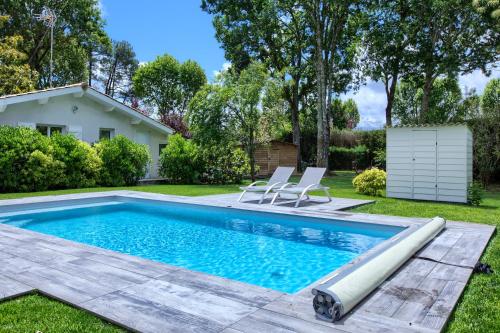 Maison de vacances Maison tout confort avec accès piscine chauffée 5 Rue Jacques Brel Andernos-les-Bains