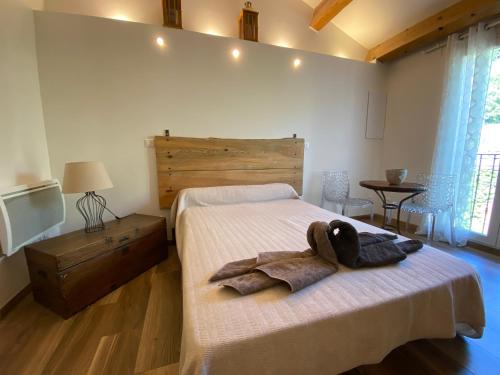A MANDRIA, appartements avec cuisine 30m2, patio, vue Montagnes et citadelle, 5 minutes à pied du centre ville et des rivières