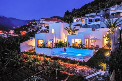Casas da Vargem shared swimming pool by An Island Apart