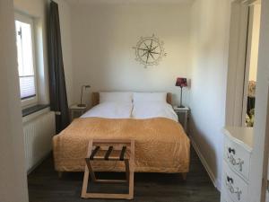 Ferienhaus Us lütt Hus und das Zimmer Linde im Haupthaus