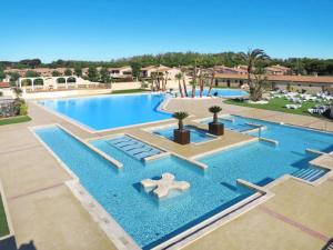 Maison avec piscine chauffée de Pâques à la toussaint TAMARIS accès animation & parc aquatique DE juin à fin septembre