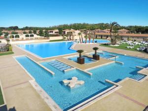 Maisons de vacances Maison avec piscine chauffée de Pâques à la toussaint TAMARIS accès animation & parc aquatique DE juin à fin septembre 2 Avenue des Mûriers 34420 Portiragnes Languedoc-Roussillon