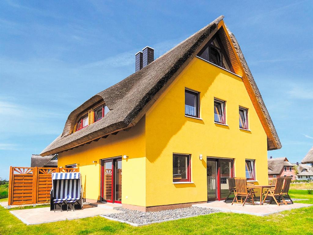 Maisons de vacances Reetdachhaus mit Sauna und Boddenblick - D 128.036 Am Breetzer Bodden 12 18569 Vieregge