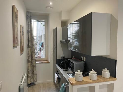 Appartement Maponi Appartement situé au rez-de-chaussée 1 Rue d' Auxonne Dijon