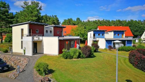 Marina Eldenburg - Ferienhäuser und Bootsverleih am Tor zur Müritz Waren allemagne