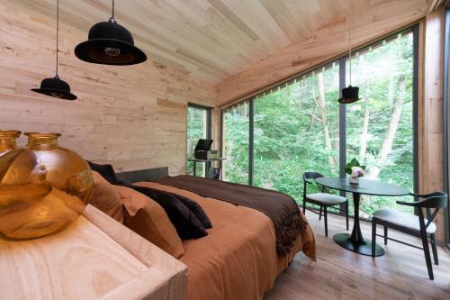 Chalets Nuits Perchées LA LEVRIE COURCERAULT 61110 COUR MAUGIS SUR HUISNE Maison-Maugis