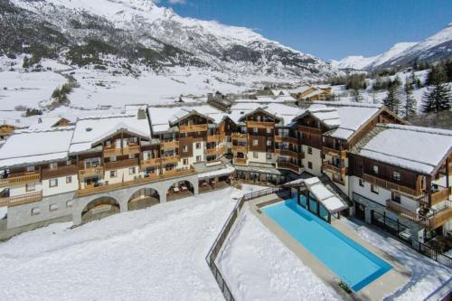 Appartement Pour 4 pers résidence 4* au pied des pistes plan des Champs Lanslebourg-Mont-Cenis