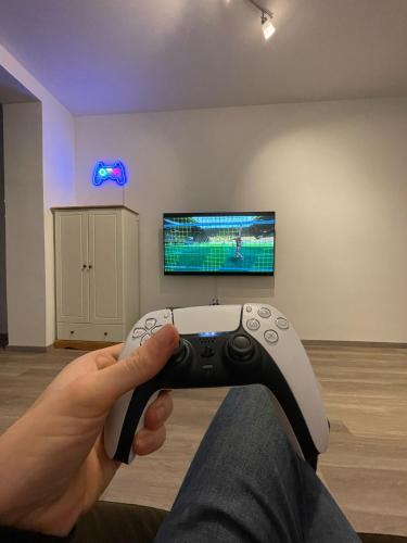 PS5+55 Zoll 4K Fernseher - Gaming Apartment Dortmund allemagne