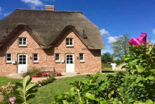 Maison de vacances Reetdachhaus Strandkoje Reetdachhaus Strandkoje Hochdorfer Weg 32 Tating