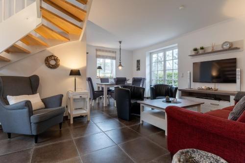 Maison de vacances Reetdachhaushälfte Reetdachhaus Kleine Kate Böhler Landstraße 131 Westereck