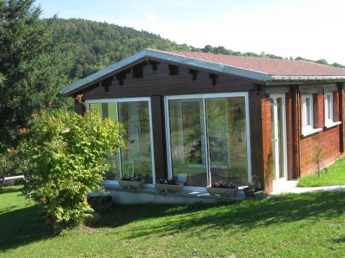 Chalet Secluded Chalet in Egliseneuve des Liards with Balcony  Égliseneuve-des-Liards