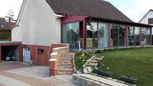3 chambres privées dans un jardin d'hiver, garage voiture, vélos, motos