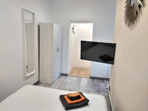 Chambre 26m avec salon et kitchenette privée