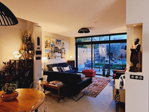 Chambre dans la maison de Mana - piscine- jacuzzi - garage pour moto