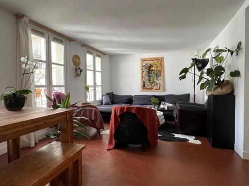 Chambres privées dans grand T4-Paris plein-centre