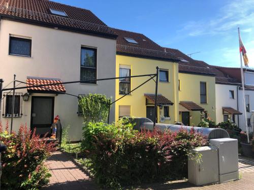 Dachgeschoss in einem Reihenhaus (mit gemeinschaftlichen Räumen)