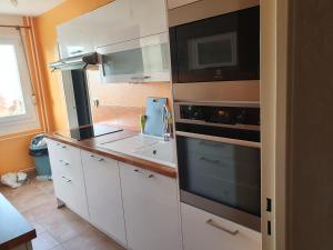 Dans grand appart de 113m2 proche Paris