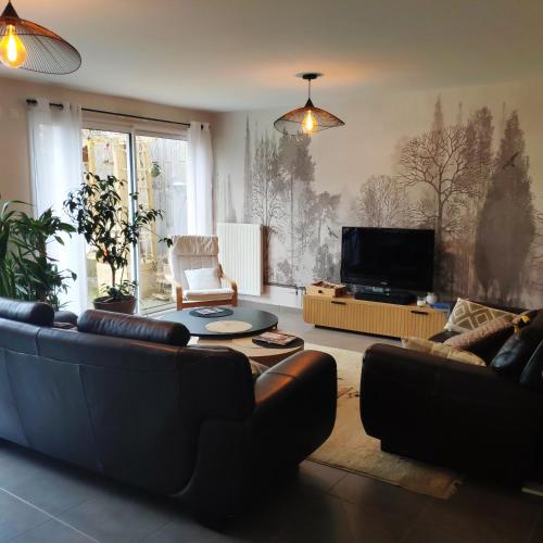 Grande chambre avec salle de bain privative