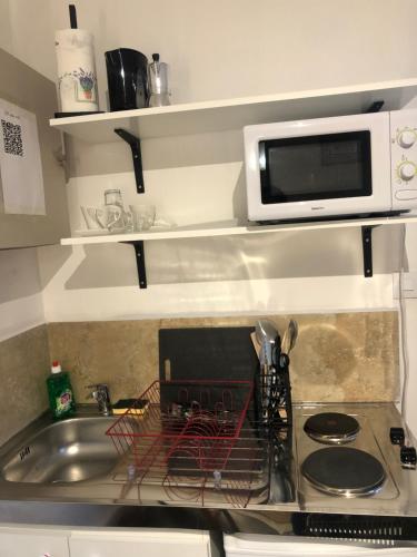 Petit studio 12 m2 et place de parking gratuite