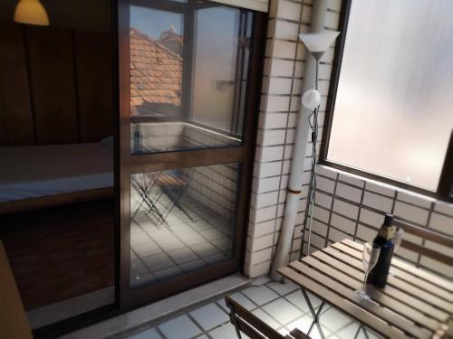 Quarto com 4 camas (Beliches+ 1 Sofá-cama)