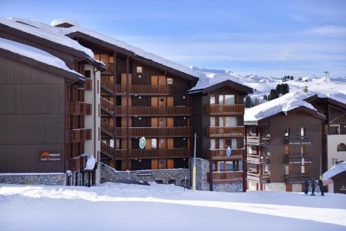 Appartement Skissim Classic - Résidence Turquoise by Travelski Dans la galerie commerciale, au dessus du restaurant La Godille Mâcot La Plagne