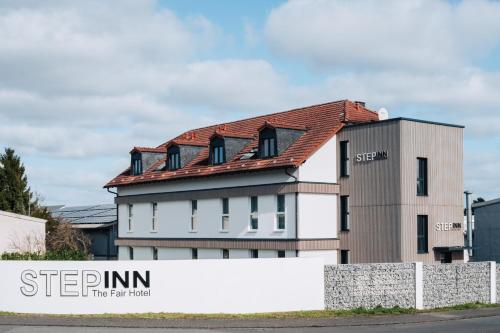 Hôtel STEP INN The Fair Hotel Raiffeisenstrasse 20 Rosbach vor der Höhe