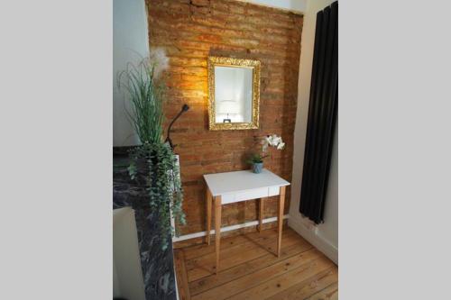 Appartement STUDIO BRICK AND WOOD - HYPERCENTRE - TV - WIFI Appartement 15 7 Rue des Puits Clos Toulouse