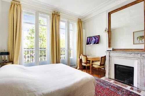 B&B / Chambre d'hôtes Suite junior avec balcon et vue sur Arc de Triomphe 2ème etage 19 Avenue de la Grande-Armée Paris