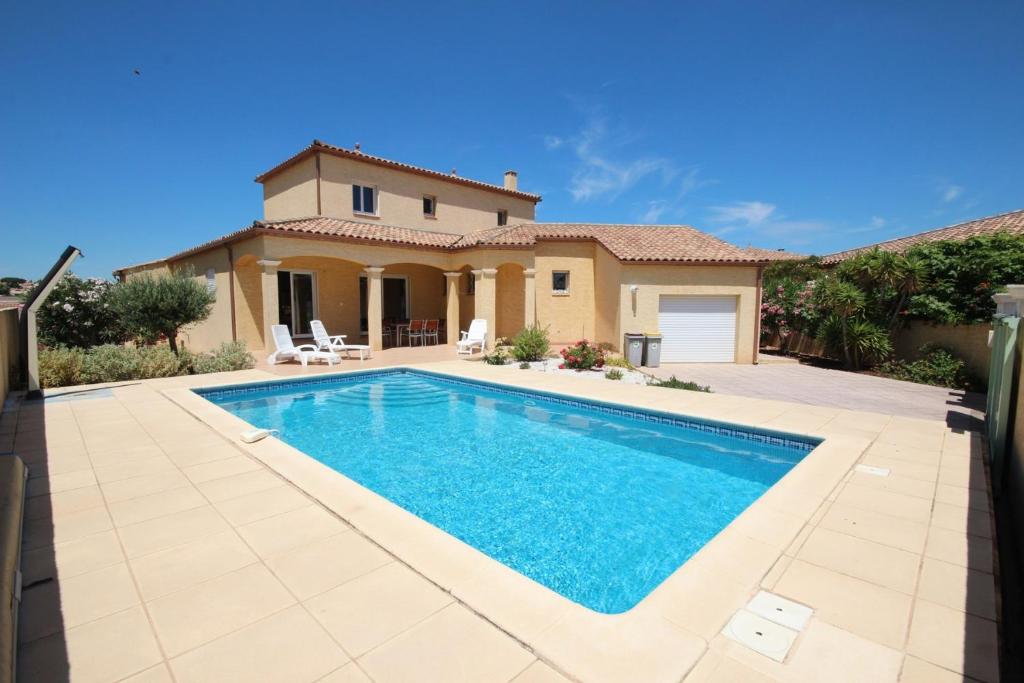 Villa Superbe villa climatisée clôturée, WIFI, 3 km de la mer, 4 belles chambres, piscine privée sur les hauteurs du village LXTOU21 21 Rue Toulouse Lautrec, 34420 Portiragnes