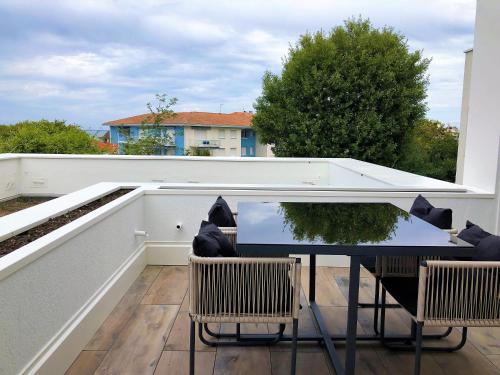 Appartement T2 lumineux vue bassin parking wifi PERLIERES 182 boulevard de la plage Arcachon