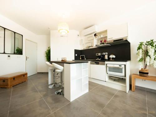 Appartement T2 – *Pratique et Business* - La Conciergerie Martinkey’s* 976 Avenue de la Mer-Raymond Dugrand Montpellier