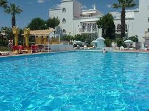 Maison de vacances Tavira Small cozy flat by the pool and by the sea Tavira Garden Lote 23 RCA Tavira