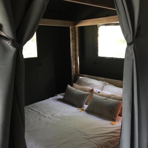 Safari tent lodges with a beautiful view at Lot Sous Toile