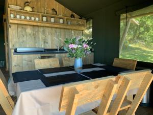 Safari tent lodges with a beautiful view at Lot Sous Toile