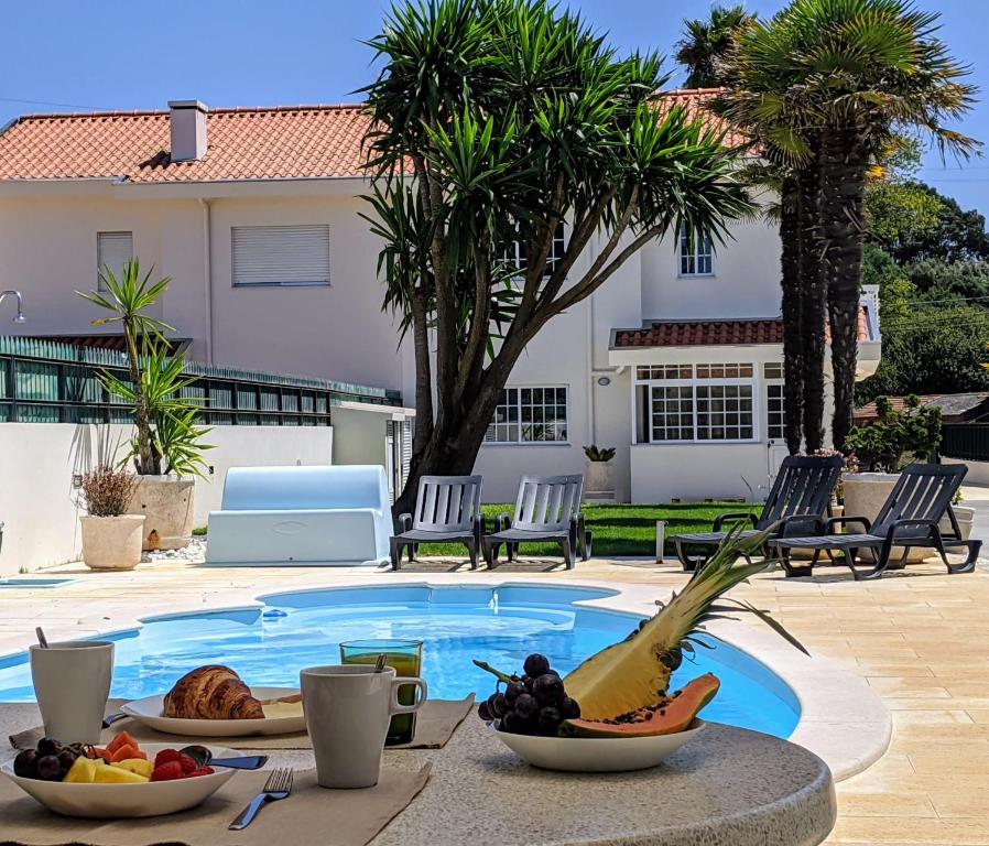 Maison de vacances The Palm House Rua Cidade de Pithivieres 215, 3880-343 Ovar