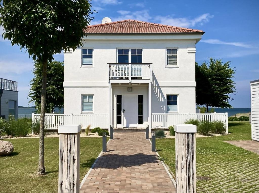 Maison de vacances Traumferienhaus Sliminde by Seeblick Ferien Am Albatrosplatz 7, 24376 Olpenitz