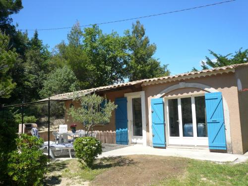 Typical house of South East France with blue shutters Buisson france