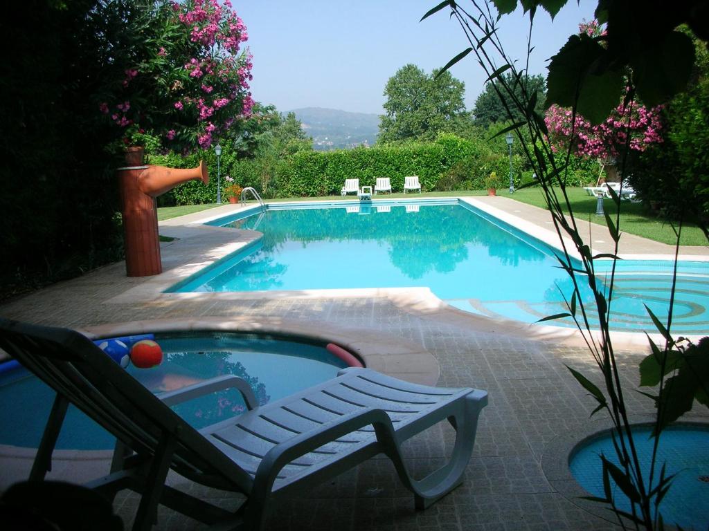 2 bedrooms villa with shared pool jacuzzi and enclosed garden at Pedraca Rua Central de Pedraça 99, 4860-282 Pedraça