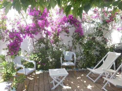 Calvi, Maison de charme, Jardin, plage 150 mètres.
