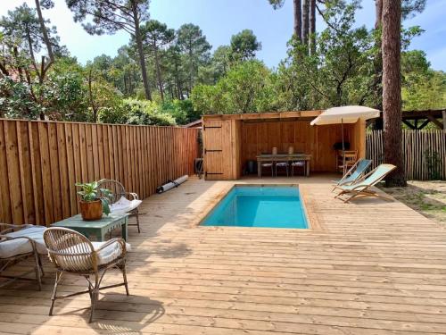 Cap Ferret villa bois avec piscine dans le village de Piquey ref 5