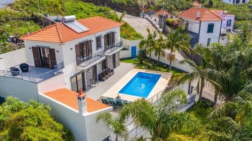 Casa Fonte Pinheiro by MHM