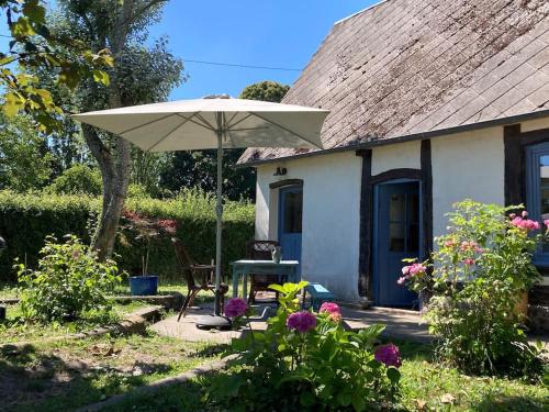Charmant cottage dans vaste domaine arboré