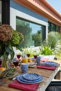 Garden Seaside Villa by CadenzaLux